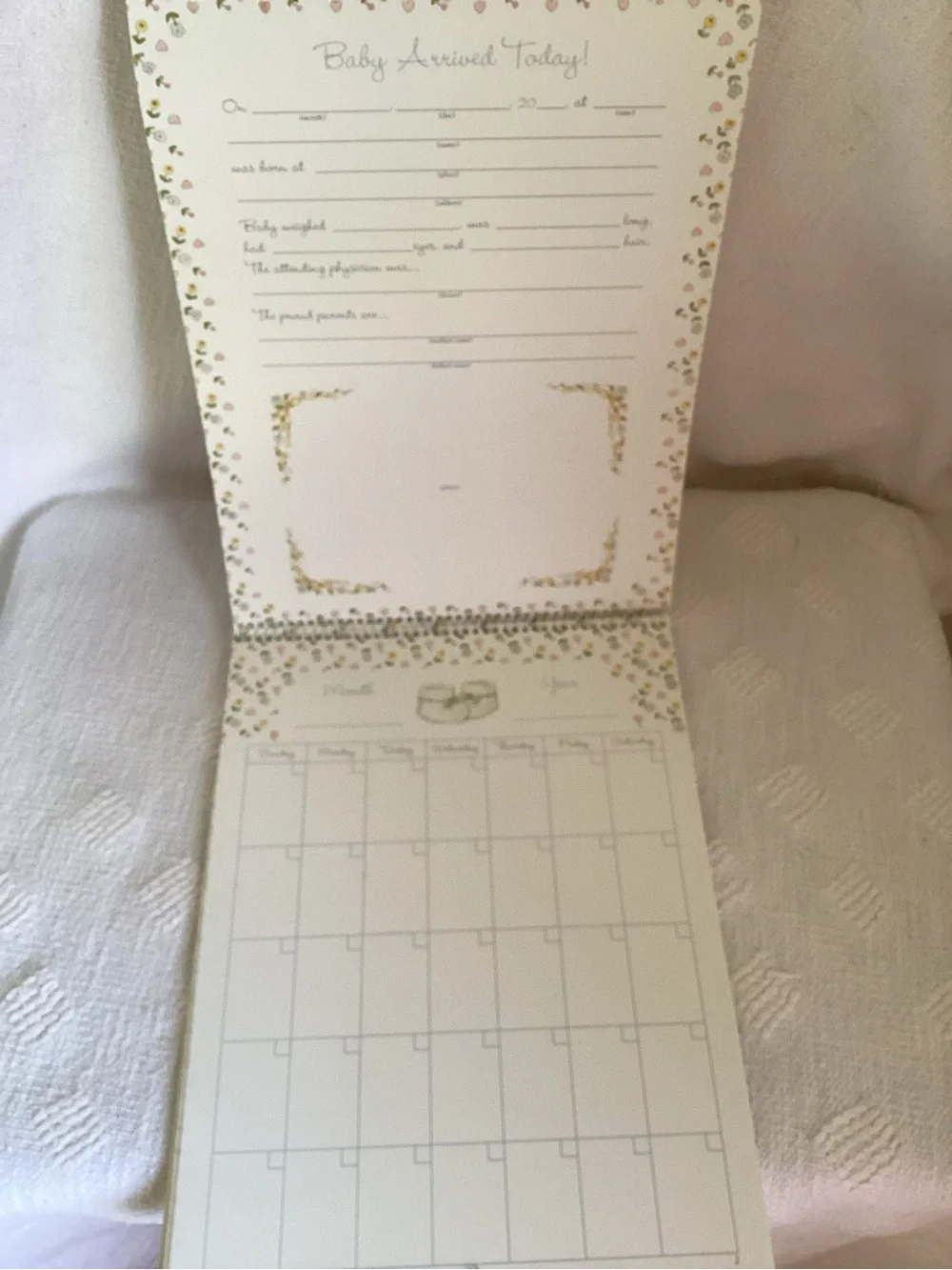 Baby’s first year calendar and milestone hardcover keepsake book